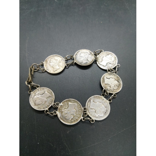 137A - A bracelet comprising 80% silver 1895, 1888, two 1900, two 1901 and 1899 Queen Victoria Hong Kong fi... 