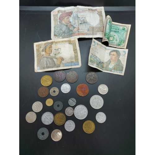 139 - A green metal tin containing a collection of worldwide coins to include American 90% silver 1964 'Ke... 