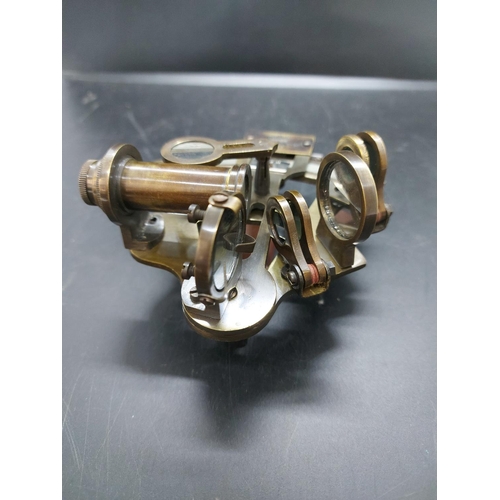 145 - A reproduction Kevin & Hughes of London brass sextant navigation instrument with wooden box