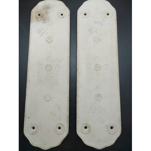 151 - Two mid 20th century porcelain push plates in the manner of Mabel Lucie Atwell with impressed marks ... 