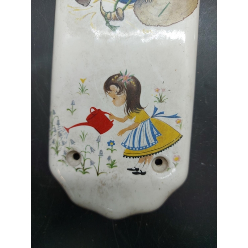 151 - Two mid 20th century porcelain push plates in the manner of Mabel Lucie Atwell with impressed marks ... 