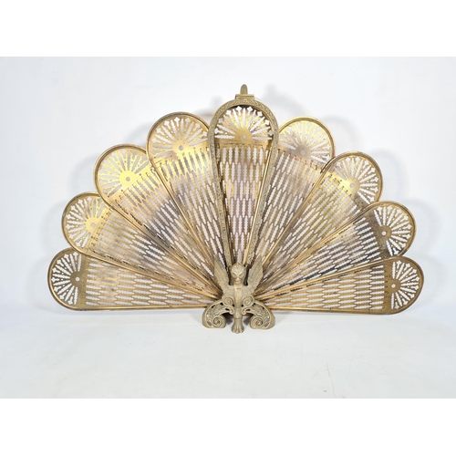 230 - Three various pieces of brassware, one stag figurine, one vintage fan fire screen and one vintage va... 