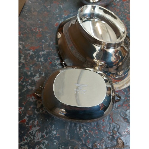 1310 - Two boxes containing good quality silver plated items to include coffee pot, milk jug, sugar bowl, t... 