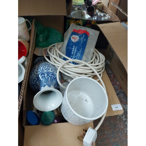 1308 - Five boxes containing collectable spoons, ceramics, glassware, plastic plant pot trays, snooker cues... 