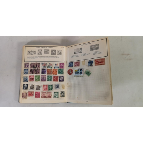 135B - Three albums containing a collection of worldwide stamps together with an as new Stanley Gibbons 'To... 