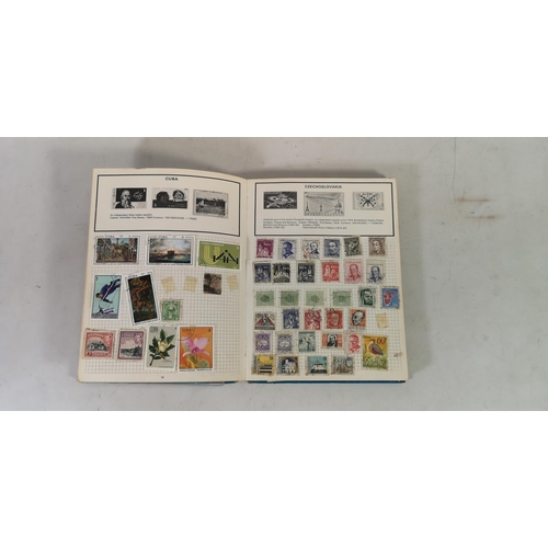 135B - Three albums containing a collection of worldwide stamps together with an as new Stanley Gibbons 'To... 