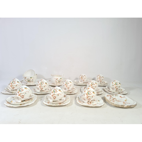 110 - A 36 piece Royal Grafton bone china tea set and a Royal Stafford London Pride plate