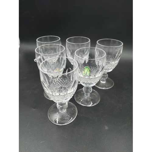 102 - Eight pieces of Waterford Crystal glass to include six port glasses, one bell and one circular trink... 