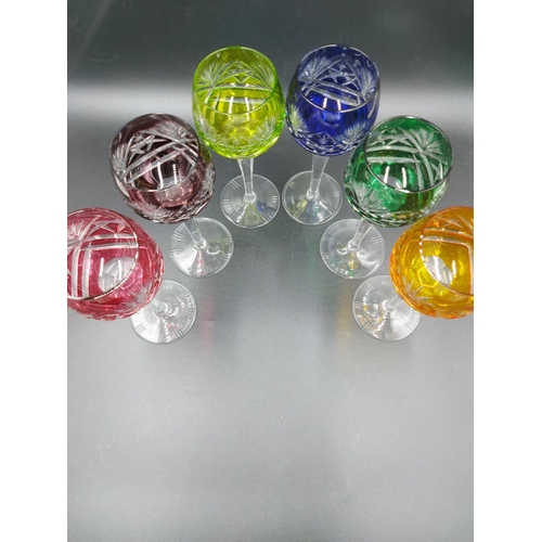 104 - A set of six vintage bohemian crystal colour overlay wine glasses - approx. 19.5cm high