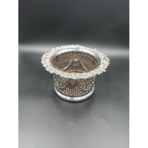 3 - A Victorian silver plate on copper bottle holder with pierced border, lion mask design and acanthus ... 