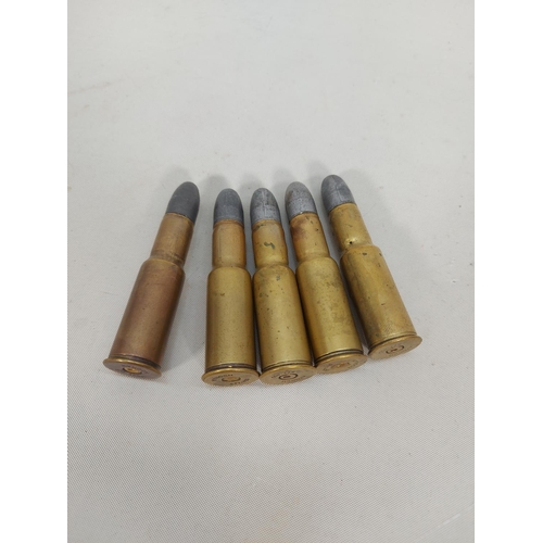 26 - Six pieces of Army ordnance and five Martini Henry blank cartridges