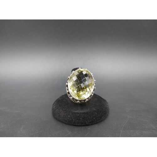 89 - A 925 silver and 50ct lemon topaz ring, size W - approx. weight 23.5 grams