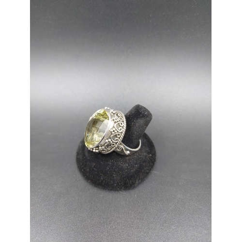 89 - A 925 silver and 50ct lemon topaz ring, size W - approx. weight 23.5 grams