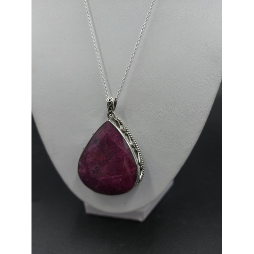 91 - A 925 silver and 150ct ruby gemstone pendant necklace - approx. gross weight 51.7 grams