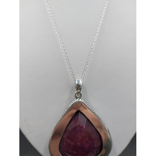 91 - A 925 silver and 150ct ruby gemstone pendant necklace - approx. gross weight 51.7 grams