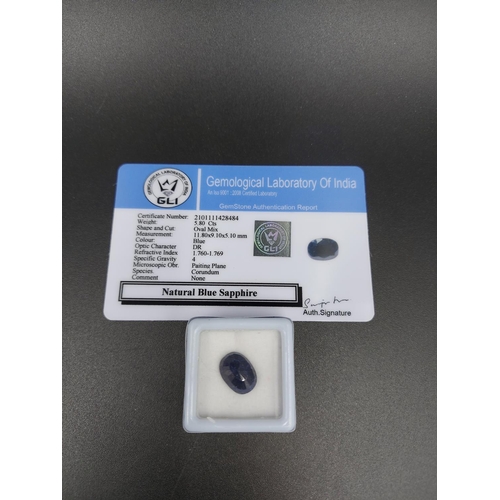 111 - Two GLI certified gemstones, one 4.25ct natural opal and one 5.80ct natural blue sapphire