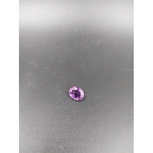 115 - A GJSPC certified 5.90ct natural amethyst gemstone