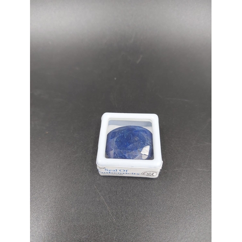 117 - A GLI certified 52ct oval natural blue sapphire colour enhanced gemstone