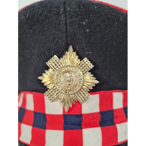 67 - A British Army Scots Guards dress forage cap