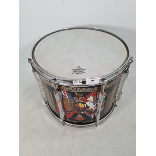 69 - A British Army Grenadier Guards marching snare drum by Premier emblazoned with battle honours - appr... 