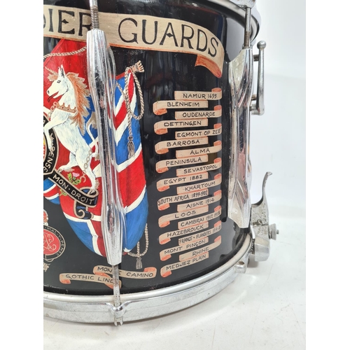 69 - A British Army Grenadier Guards marching snare drum by Premier emblazoned with battle honours - appr... 