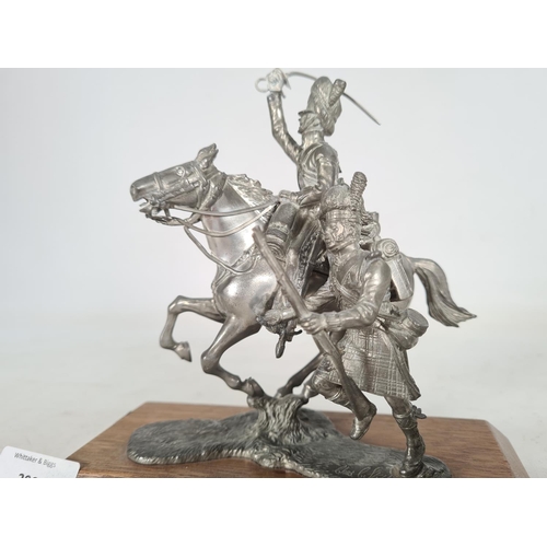 76 - A Charles C. Stadden pewter group figurine of a trooper from the 2nd or Royal North British Dragoons... 