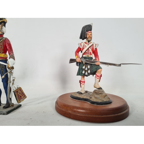 82 - Three hand painted military figurines