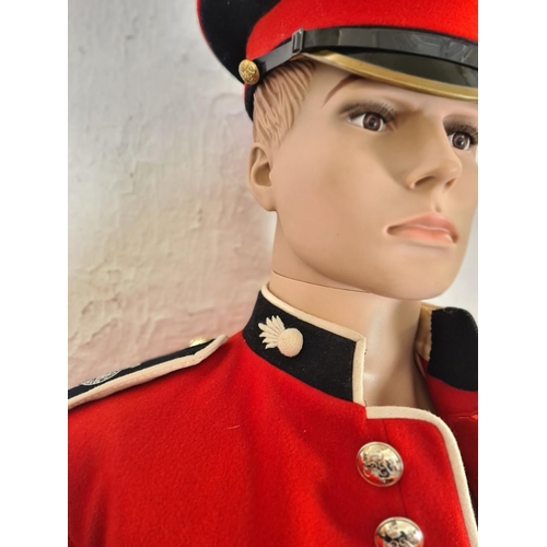 67A - A British Army Grenadier Guards full dress uniform with mannequin