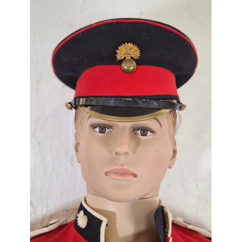 67A - A British Army Grenadier Guards full dress uniform with mannequin