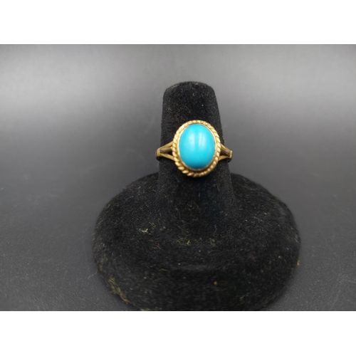 152 - A hallmarked 9ct gold ring with inset oval turquoise stone, size P - approx. gross weight 2.28 grams