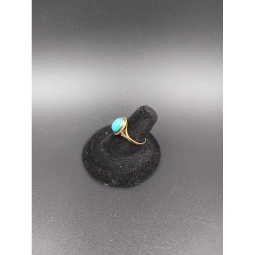 152 - A hallmarked 9ct gold ring with inset oval turquoise stone, size P - approx. gross weight 2.28 grams