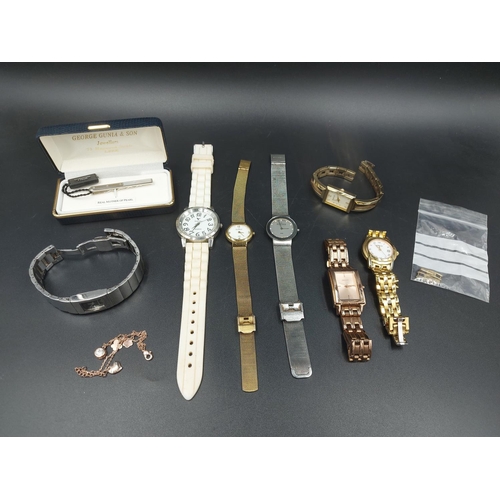 177 - Seven modern ladies wristwatches to include one Gucci, two Skagen of Denmark, one DKNY, one Emporio ... 