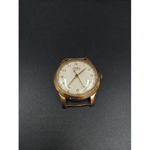 182 - A believed 9ct gold mens Trebex 17 jewel presentation wrist watch with later added brown leather str... 