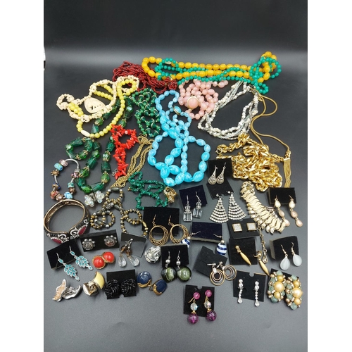 188 - A collection of vintage and modern costume jewellery to include carved necklace with elephant design... 