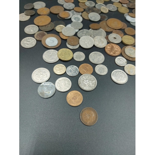 190 - A collection of world coins to include 1817 92.5% silver sixpence, eight pre 1920 92.5% silver three... 