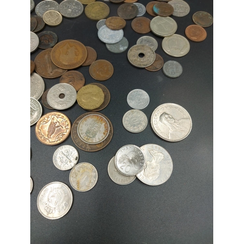 190 - A collection of world coins to include 1817 92.5% silver sixpence, eight pre 1920 92.5% silver three... 