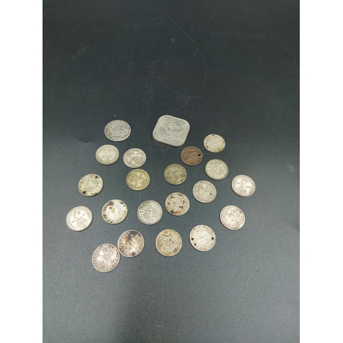 190 - A collection of world coins to include 1817 92.5% silver sixpence, eight pre 1920 92.5% silver three... 