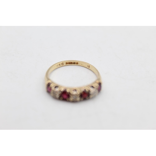 106 - A 9ct gold ruby and diamond set ring, size P - approx. gross weight 2.3 grams