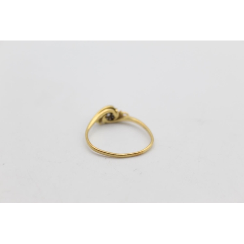 108 - An 18ct gold diamond solitaire ring, size O½ - approx. 1.8 grams