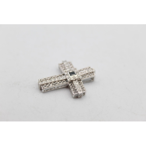 109 - A 9ct white gold diamond and sapphire religious cross pendant - approx. gross weight 2.2 grams