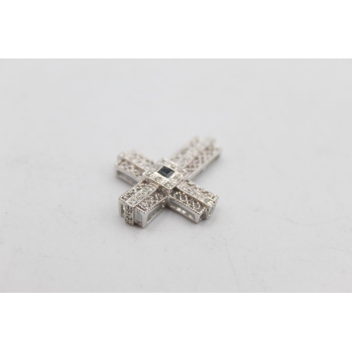 109 - A 9ct white gold diamond and sapphire religious cross pendant - approx. gross weight 2.2 grams