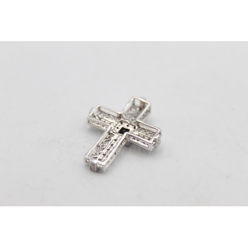 109 - A 9ct white gold diamond and sapphire religious cross pendant - approx. gross weight 2.2 grams