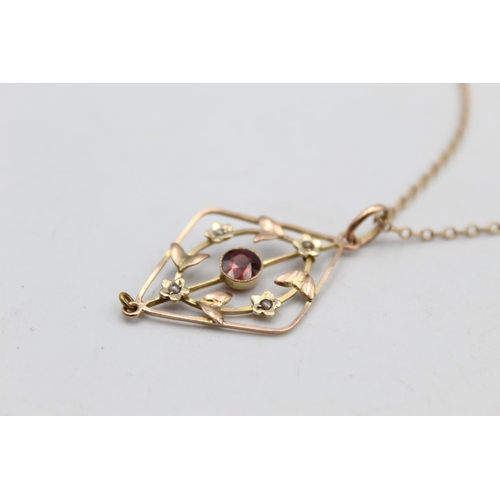 118 - A 9ct gold garnet and seed pearl drop pendant necklace - approx. gross weight 4.4 grams