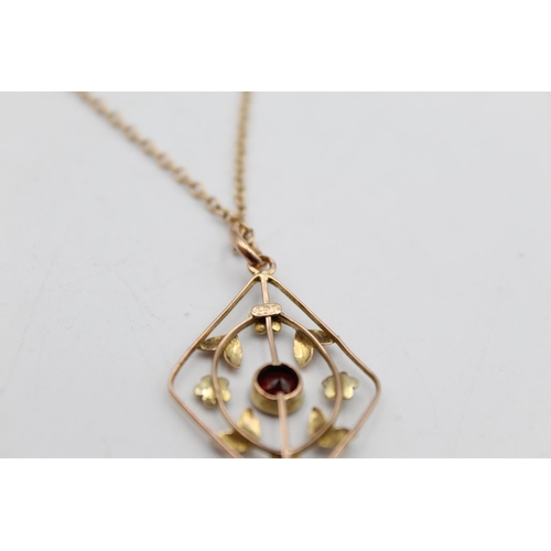 118 - A 9ct gold garnet and seed pearl drop pendant necklace - approx. gross weight 4.4 grams