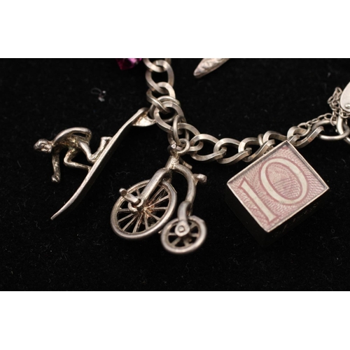 139 - A 925 sterling silver charm bracelet with heart padlock and animals - approx. gross weight 32 grams ... 