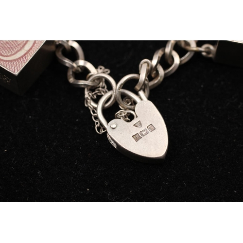 139 - A 925 sterling silver charm bracelet with heart padlock and animals - approx. gross weight 32 grams ... 