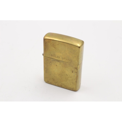 348 - Two Zippo brass lighters