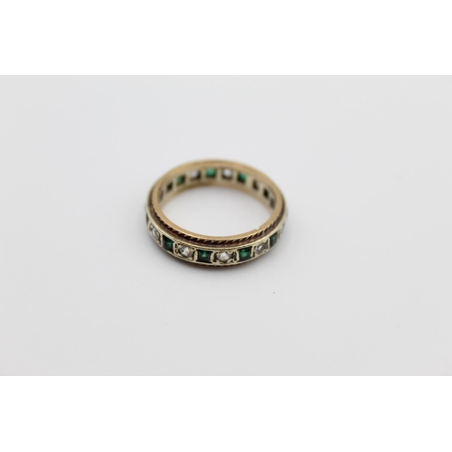 14 - A 9ct gold emerald paste eternity ring, size M ½ - approx. gross weight 3.7 grams