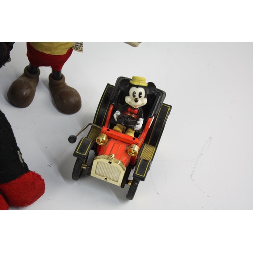 546 - Five vintage Disney Mickey Mouse toys including Masudaya Tinplate, Pull Cord, Mattel etc.