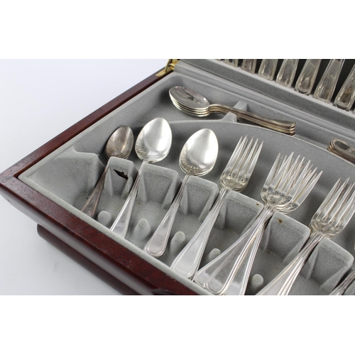 474 - A vintage fifty five piece Viners silver plate beaded cutlery set in original canteen